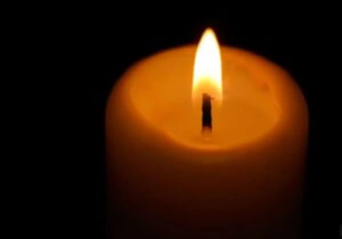 A serene landscape depicting a peaceful scene of nature, symbolizing loss and remembrance.