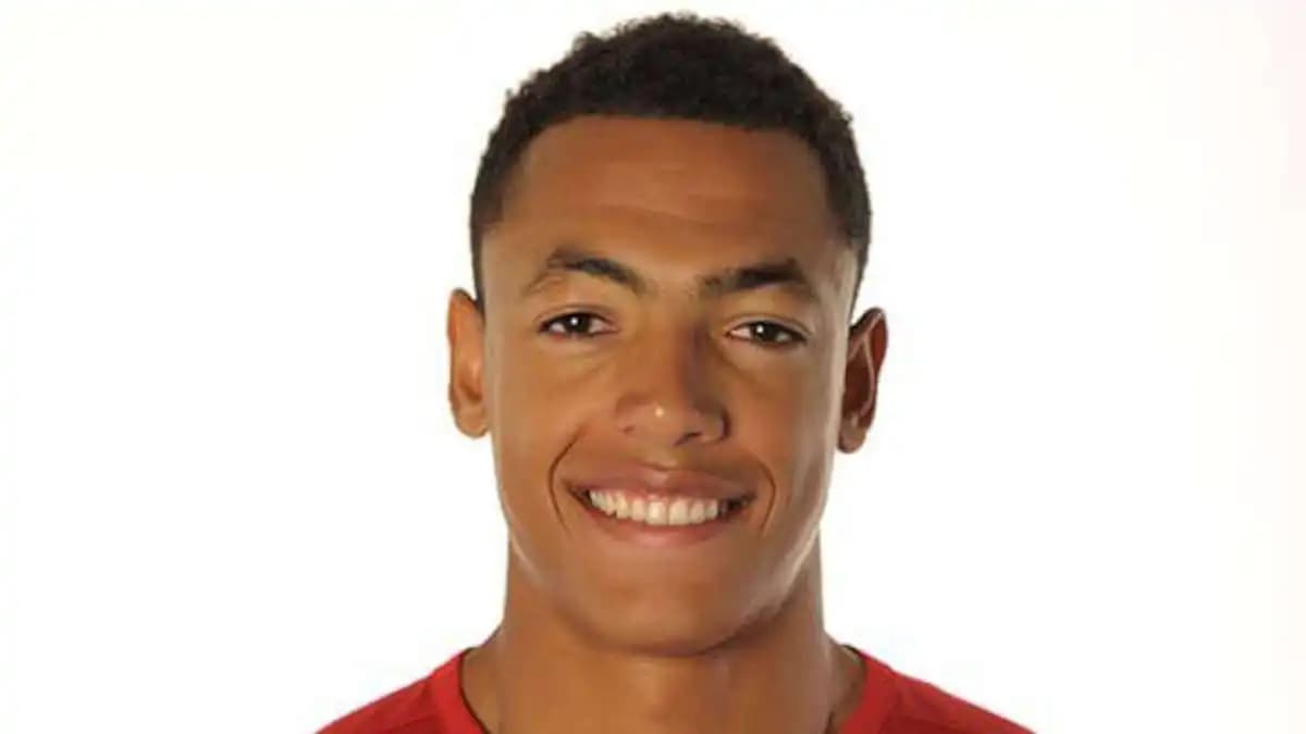 Portrait of Yohan Roche, a young man with dark hair and a thoughtful expression, wearing a casual shirt.