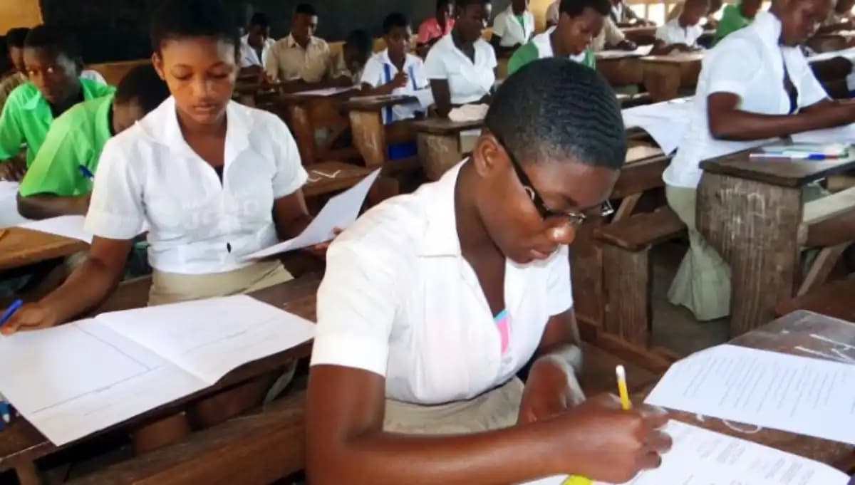Candidates preparing for the BEPC exam in Togo, focused and engaged in their studies.