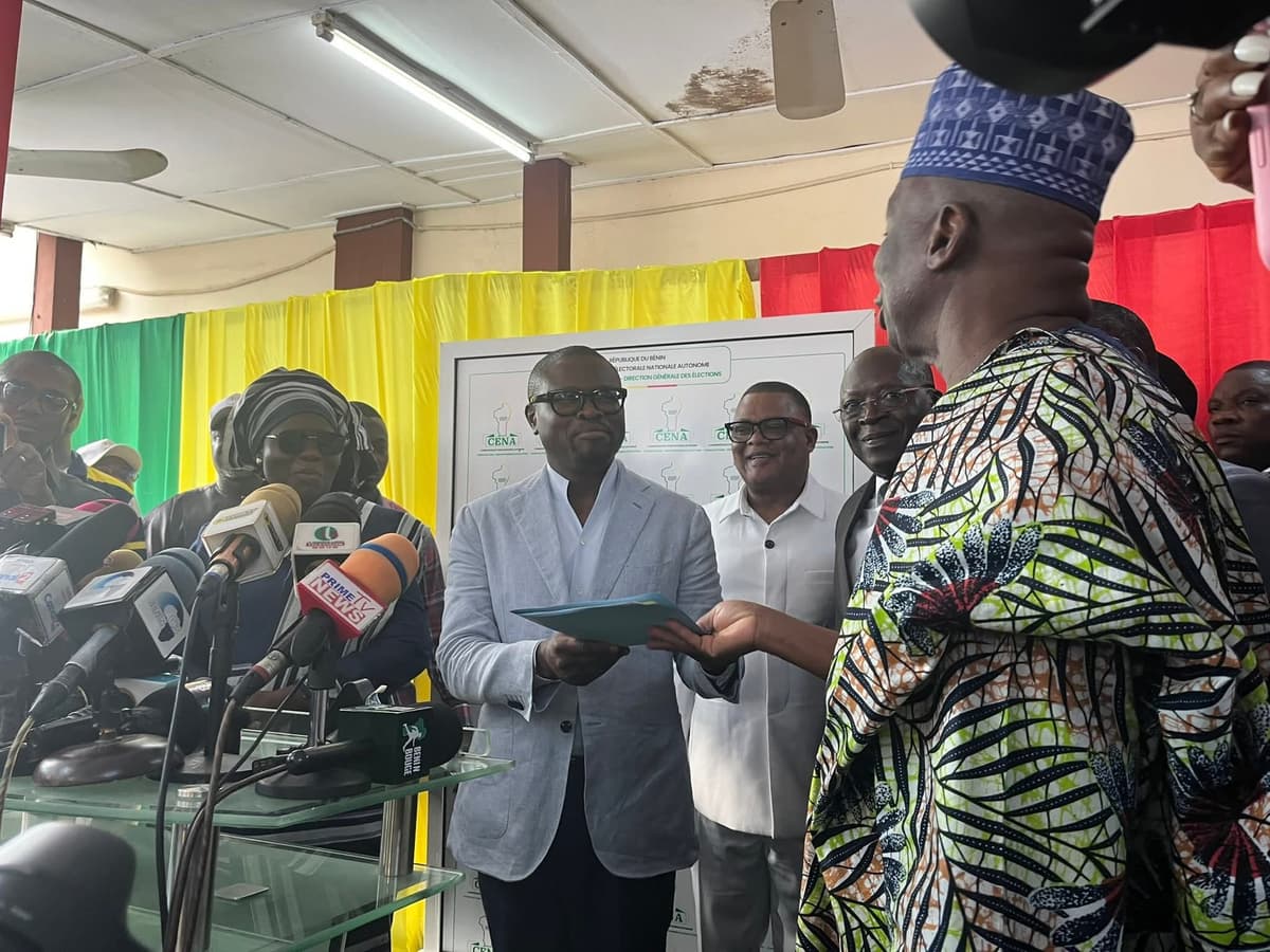 Romuald Wadagni holding his candidacy submission receipt for the 2026 presidential election in Benin.