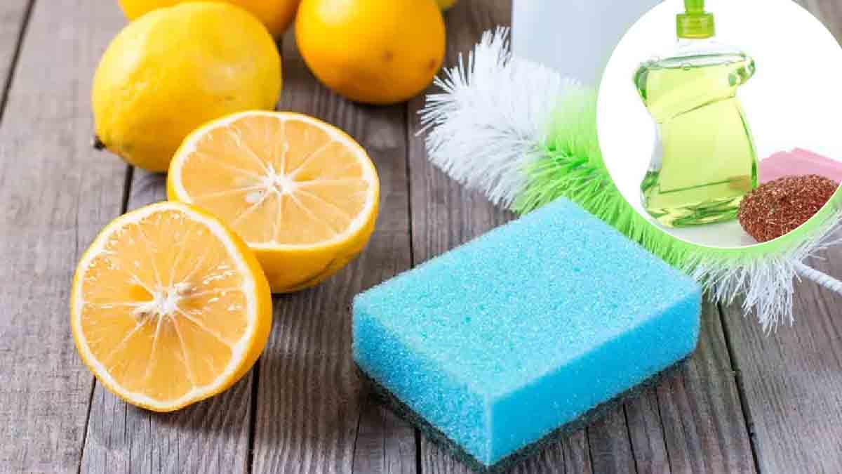 un citron coupé en deux, des citrons non coupés, deux éponges, et une bouteille de savon liquide