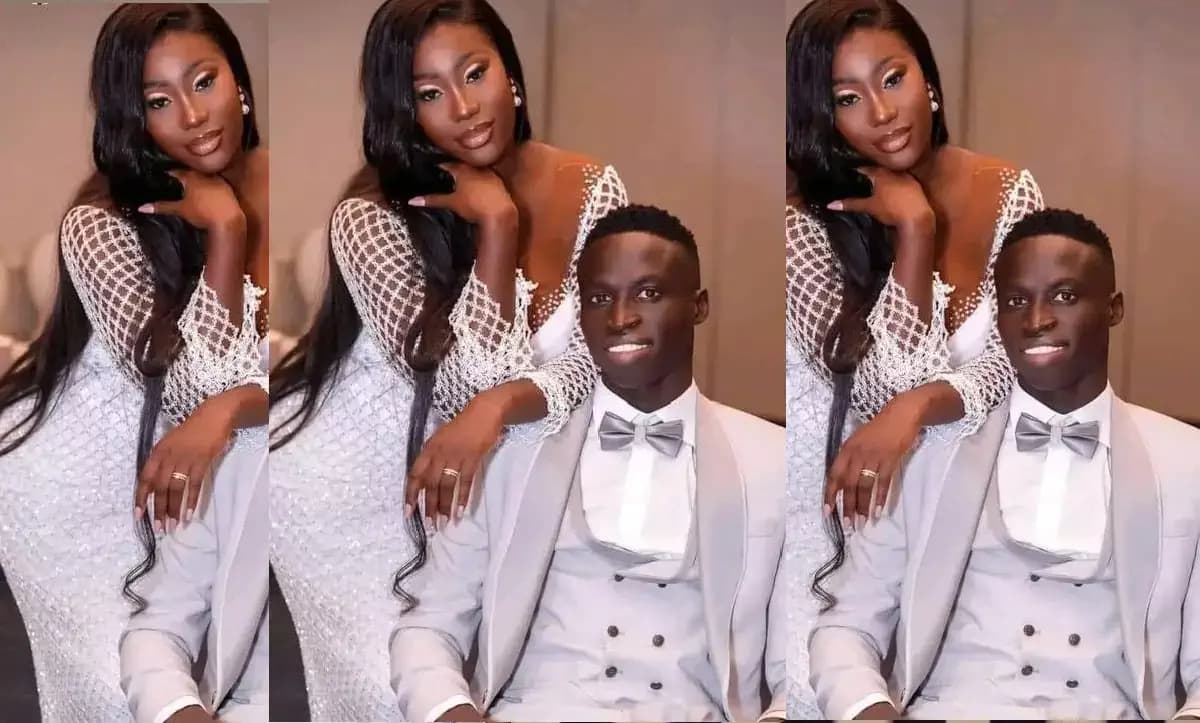 Krépin Diatta lors d'un événement, souriant et confiant, entouré de fans.