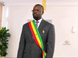Senegal: Ousmane Sonko greets PM Ahmadou Al Aminou Lô while maintaining his distance.