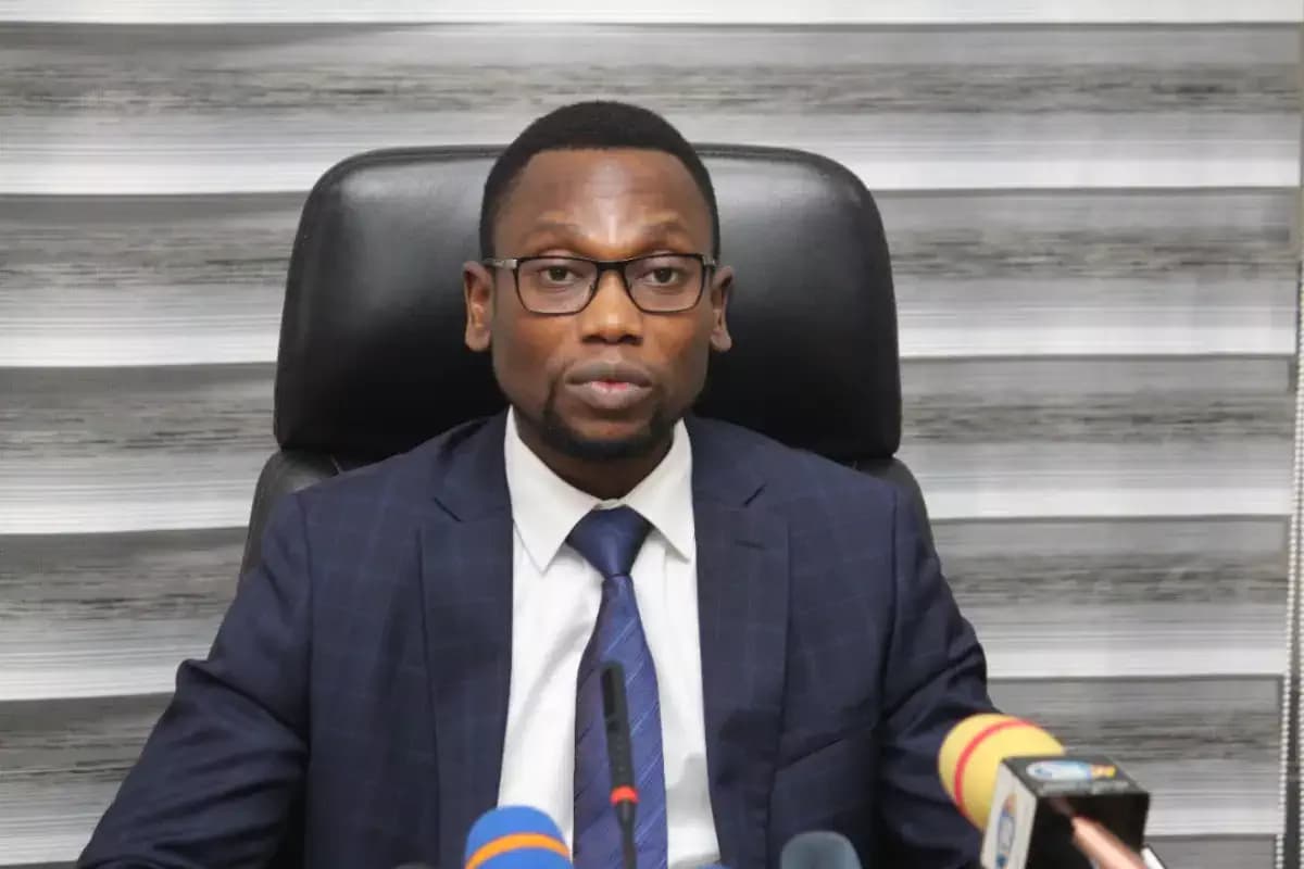 Benjamin Hounkpatin, Minister of Health of Benin, speaking at a hospital expansion event.