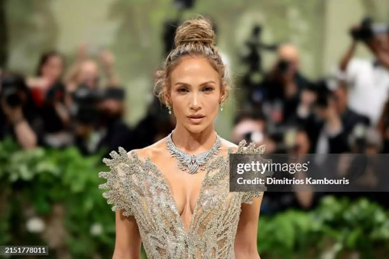 Jennifer Lopez, 57, shines in a crystal-embellished swimsuit for Labor Day