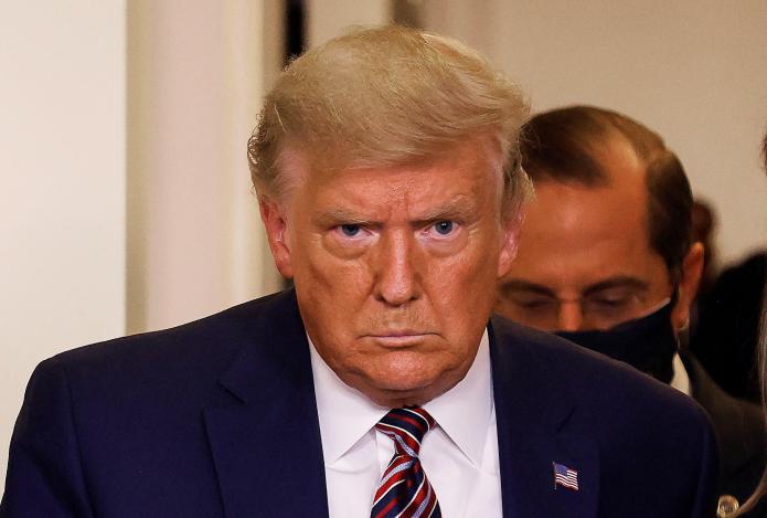 Donald Trump à la Maison Blanche face à la presse le 20 novembre 2020. REUTERS - CARLOS BARRIA