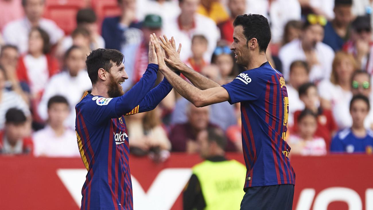 Lionel Messi et Sergio Busquets sous le maillot du FC Barcelone