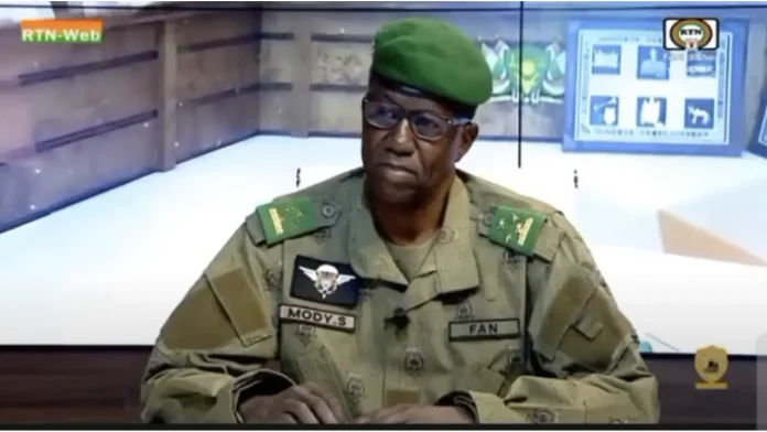 Le Ministre d'État, Ministre de la Défense Nationale, le Général de corps d'armée Salifou Mody