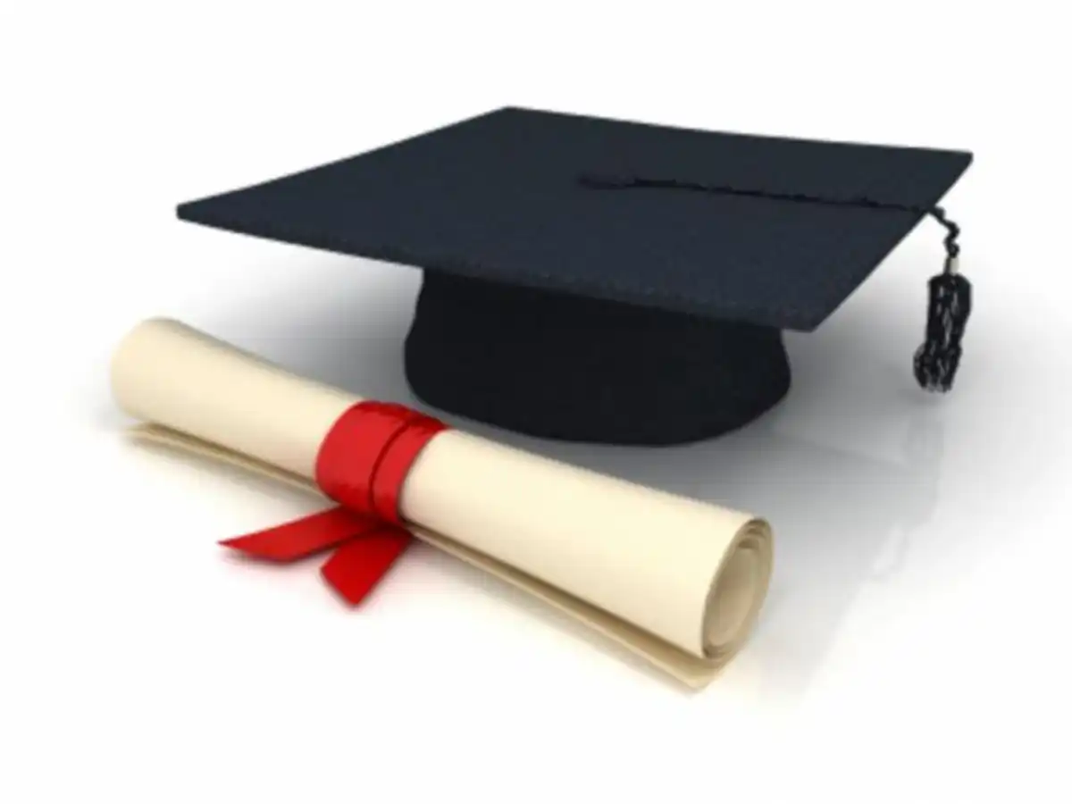 University diplomas displayed on a table, representing the collection of License and Master's certificates in Benin.